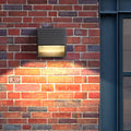 Minimalist black linear LED wall light on a modern villa exterior — Villa Wall Light — Touched Home